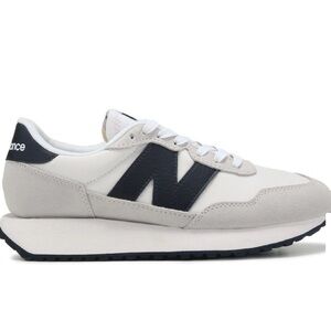 New Balance Cream and black Sneakers